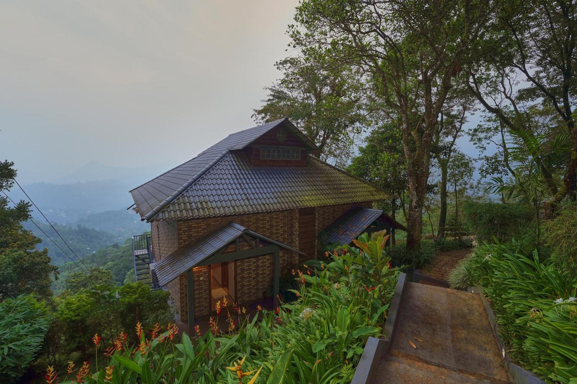 Elephant Passage Муннар Экстерьер фото A cottage at the resort